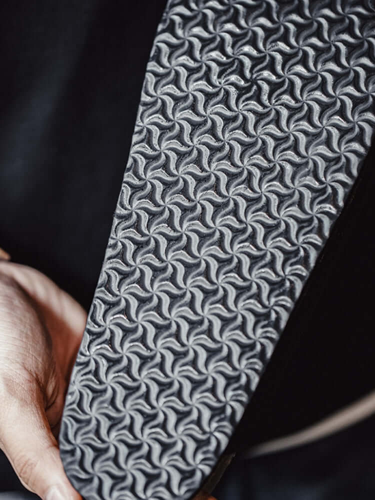 Schwarze Pantoletten von Caen