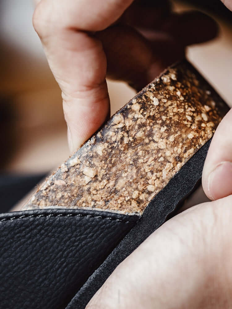 Schwarze Pantoletten von Caen